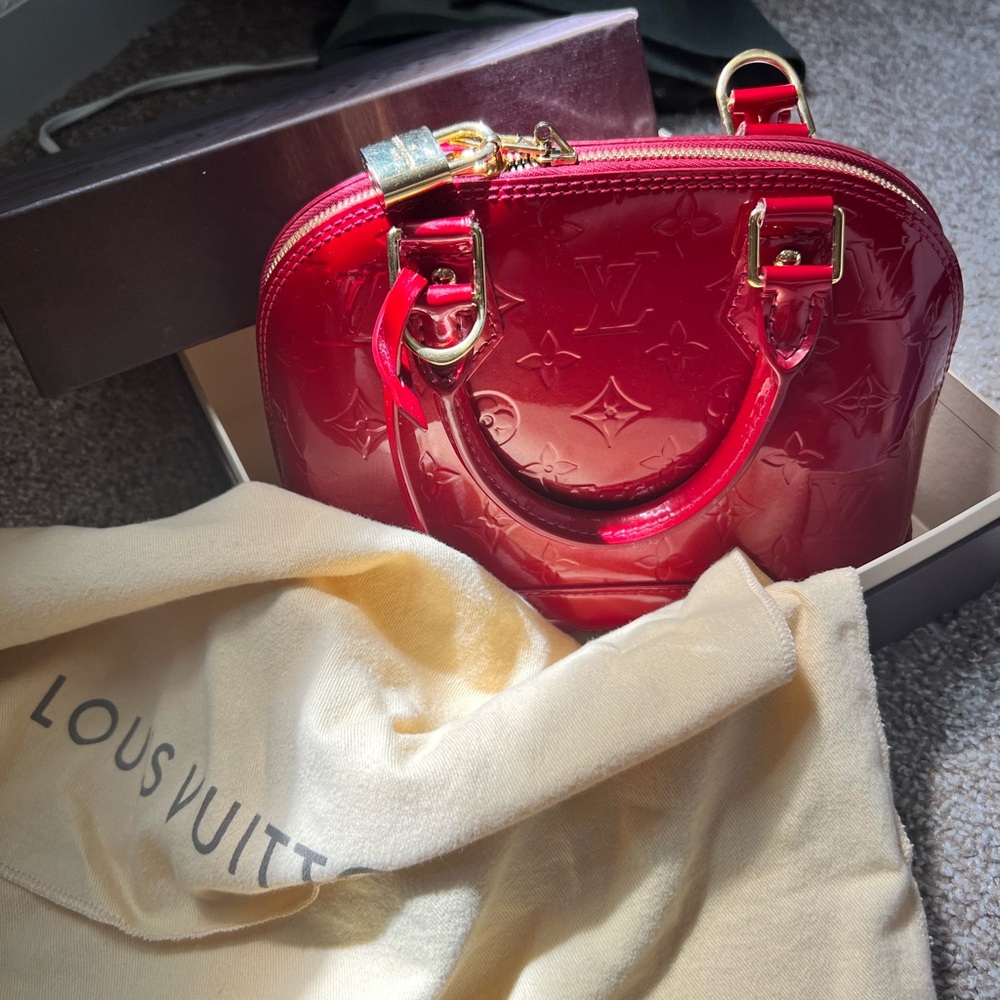 Louis Vuitton Alma bb bag in cherry red